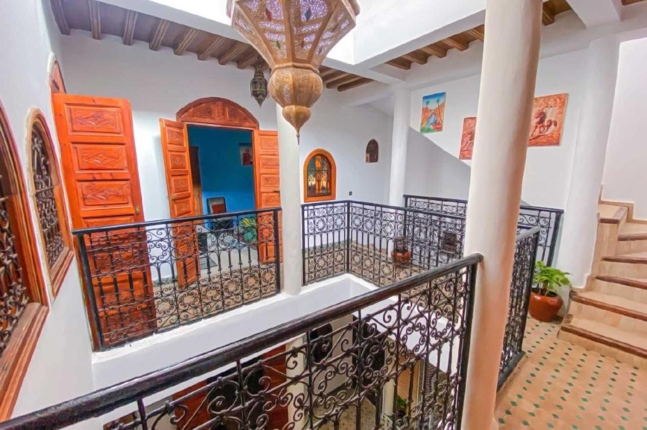 Riad Ouhmidi *